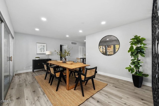 dining room with baseboards, recessed lighting, visible vents, and light wood-style floors