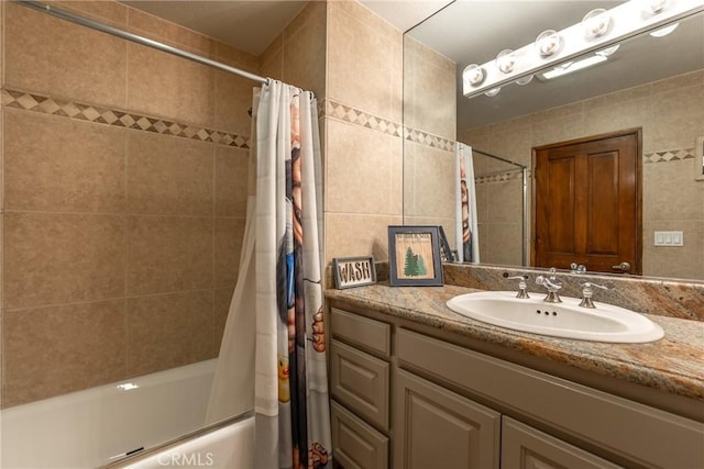 bathroom with vanity and shower / tub combo