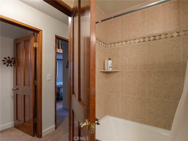 bathroom with shower / bathtub combination with curtain