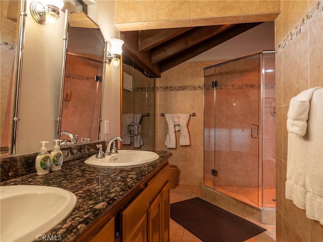 bathroom with vaulted ceiling with beams, tile patterned flooring, vanity, and an enclosed shower