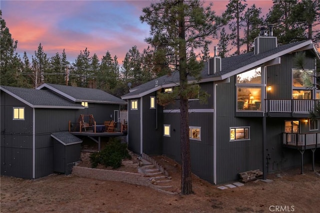 back house at dusk with central AC