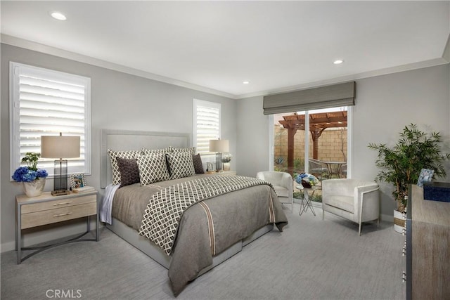 bedroom with carpet floors and ornamental molding