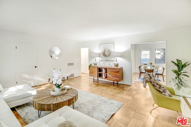 living room featuring light parquet floors