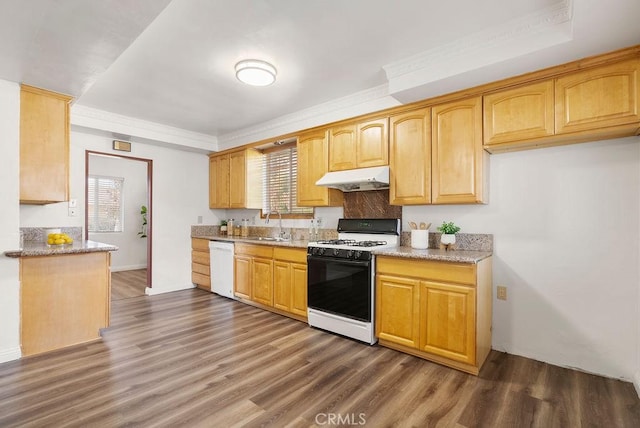 kitchen with dark hardwood / wood-style flooring, white appliances, and crown molding