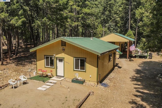 view of front of house featuring a wooden deck