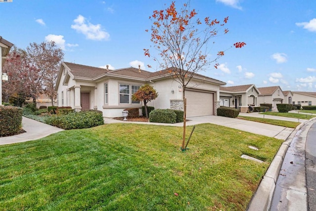 ranch-style home featuring a front lawn and a garage