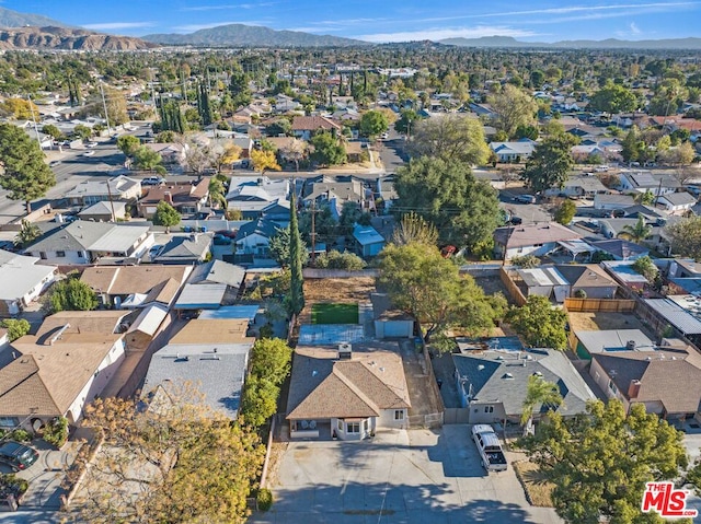 drone / aerial view featuring a mountain view