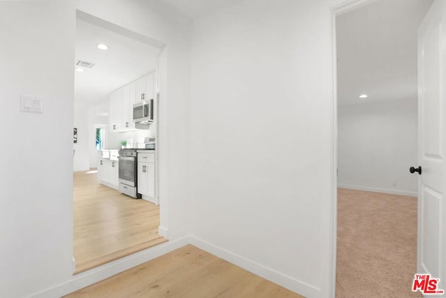 hall featuring light hardwood / wood-style floors