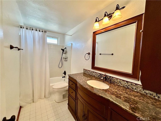 full bathroom featuring shower / tub combo with curtain, vanity, toilet, tile patterned floors, and a textured ceiling