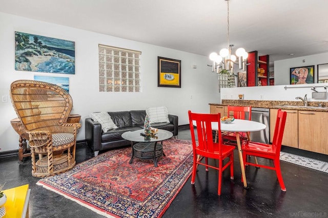 dining room with sink and an inviting chandelier