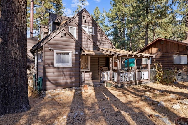 view of log cabin