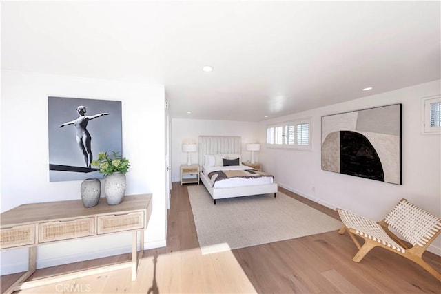 bedroom featuring wood-type flooring