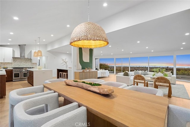 dining area with light hardwood / wood-style floors