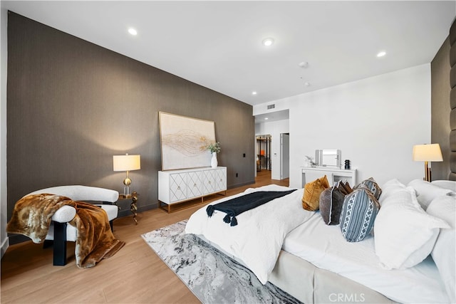 bedroom featuring light wood-type flooring