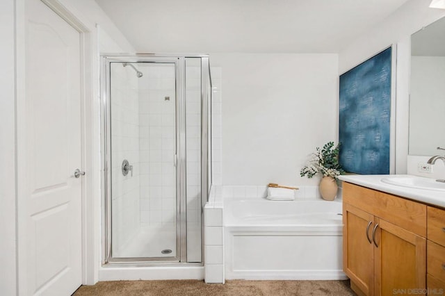 bathroom with vanity and plus walk in shower