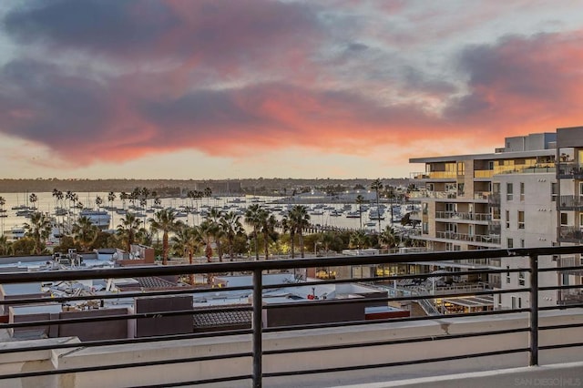 balcony at dusk with a water view