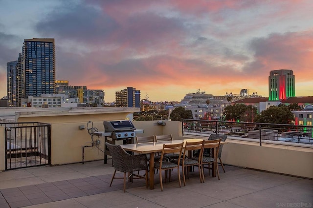 patio terrace at dusk with area for grilling