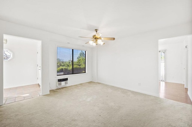 unfurnished living room featuring carpet flooring, heating unit, and ceiling fan