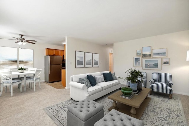 living room with ceiling fan and light colored carpet