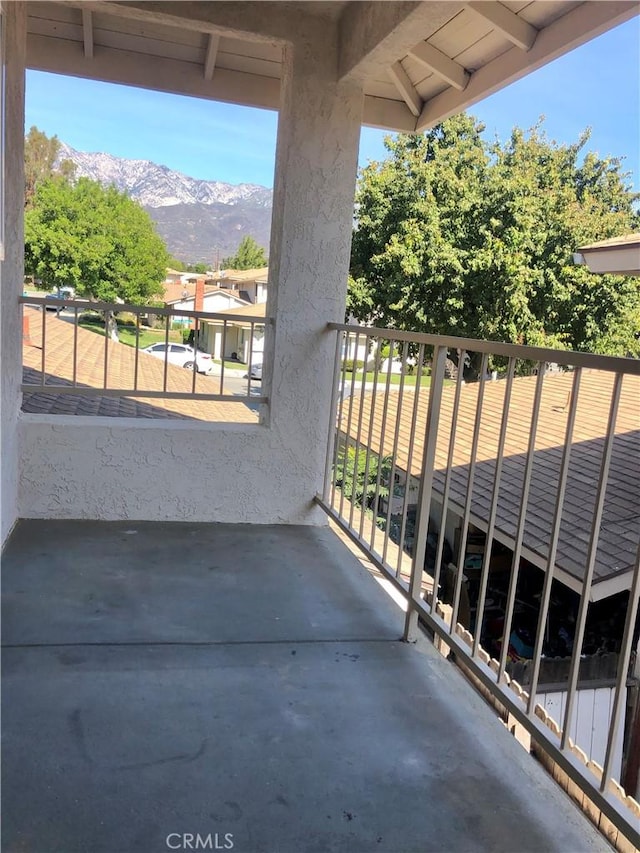 balcony featuring a mountain view