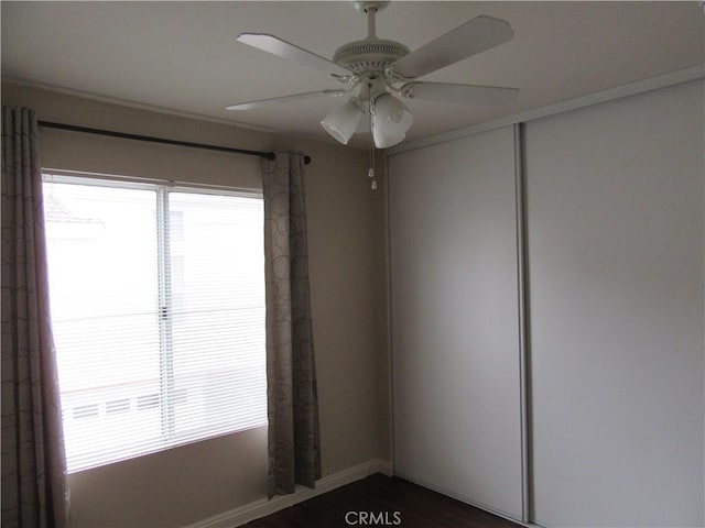 unfurnished room with ceiling fan