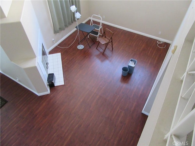 living room with dark hardwood / wood-style floors