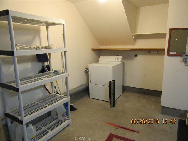 laundry area with electric panel and washer / clothes dryer