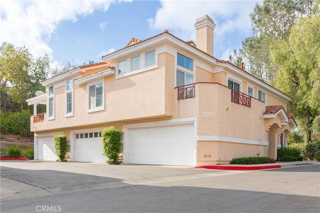 view of front of house with a garage