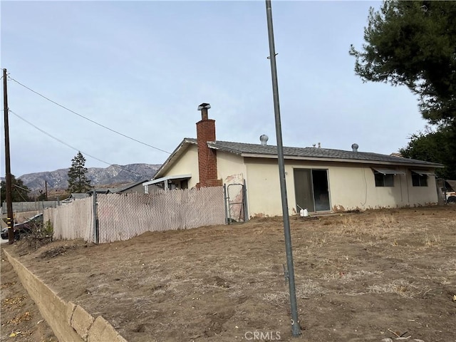 exterior space featuring a mountain view