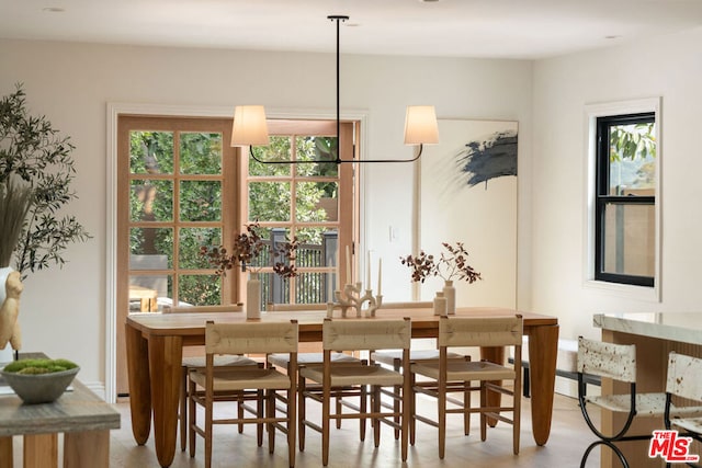 dining space with a healthy amount of sunlight