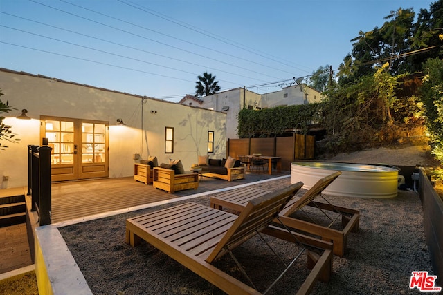 view of patio featuring a pool side deck, an outdoor hangout area, and french doors