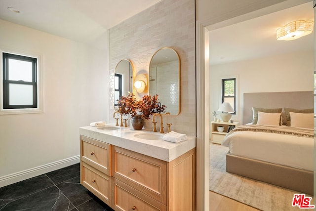 bathroom featuring hardwood / wood-style floors and vanity