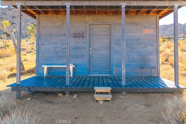 view of outbuilding featuring a mountain view