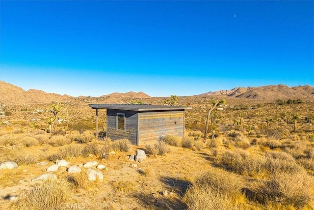 view of outdoor structure featuring a mountain view