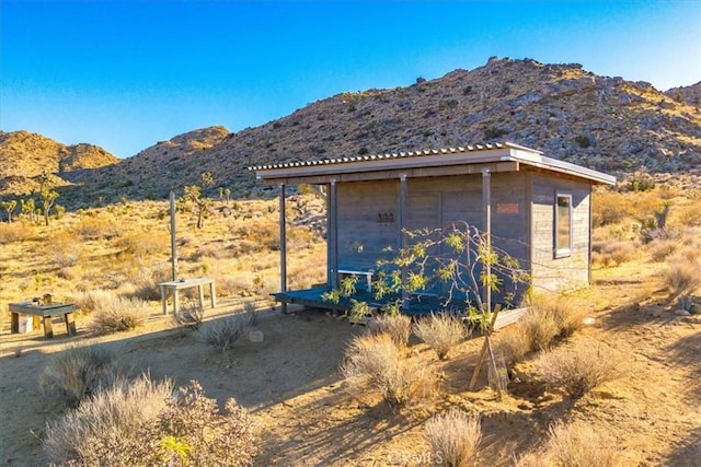 exterior space featuring a mountain view