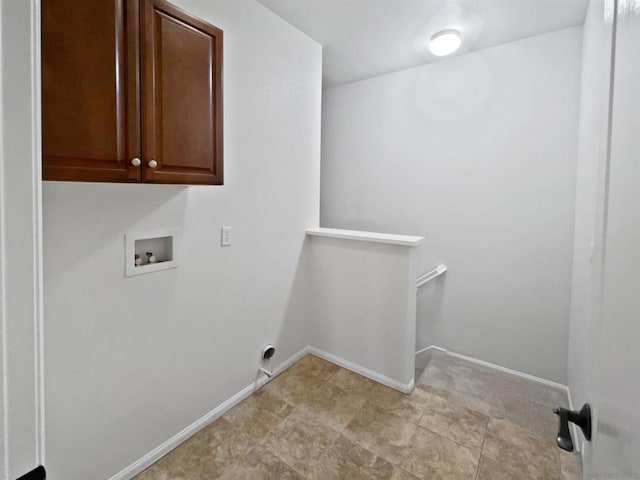 laundry room with cabinets and washer hookup