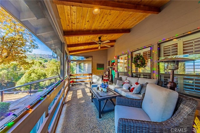 view of patio featuring a balcony and an outdoor living space