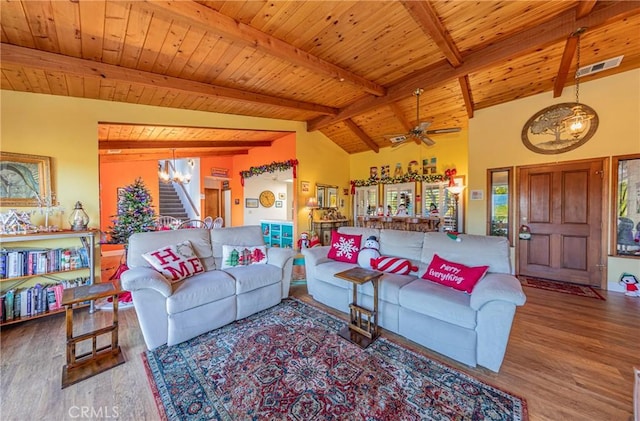 living room with ceiling fan, wooden ceiling, hardwood / wood-style floors, and beam ceiling