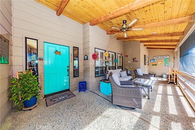 interior space with ceiling fan and an outdoor hangout area