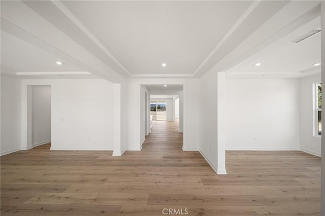 interior space featuring light wood-type flooring, baseboards, and recessed lighting