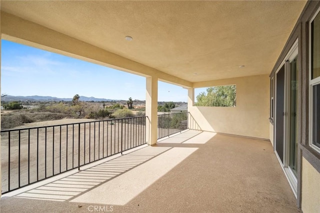 balcony featuring a mountain view