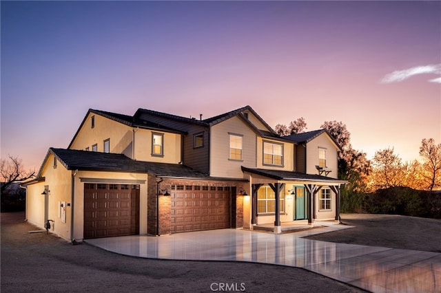 view of front of house featuring driveway