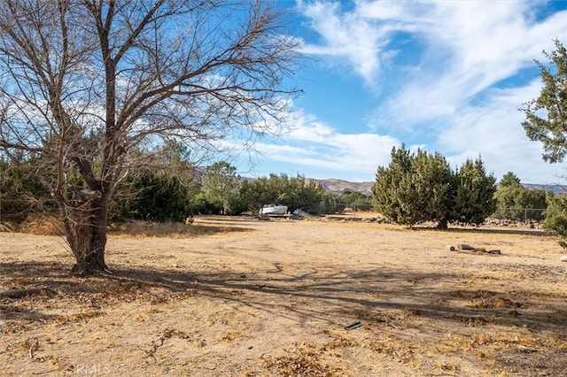 exterior space with a rural view