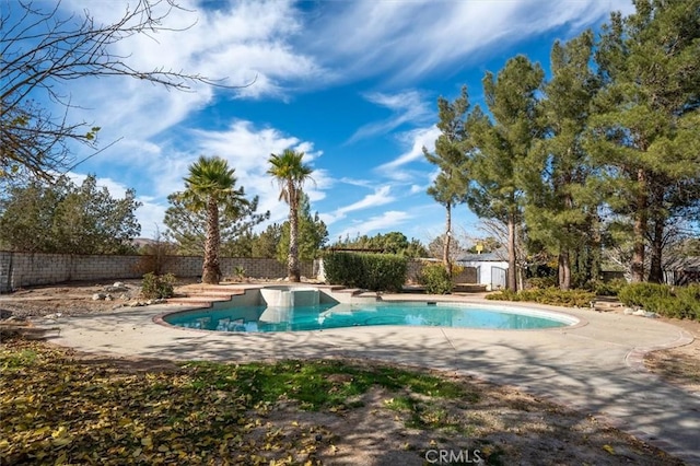 view of swimming pool featuring a patio