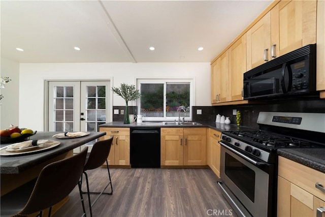 kitchen with light brown cabinets, french doors, black appliances, sink, and dark hardwood / wood-style flooring