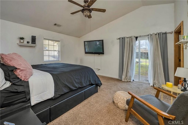 carpeted bedroom with vaulted ceiling and ceiling fan