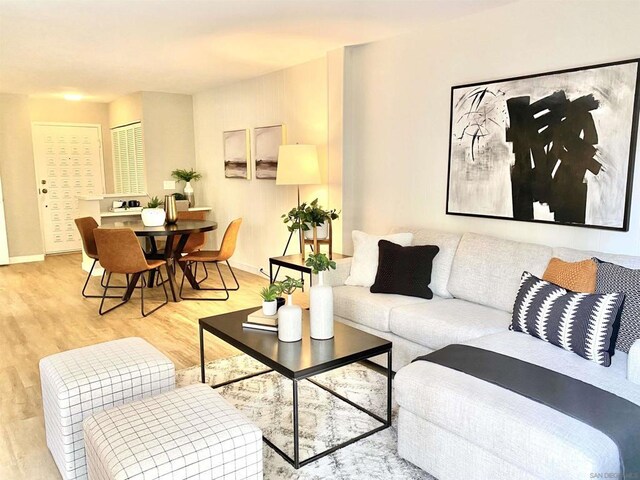 living room with light hardwood / wood-style flooring