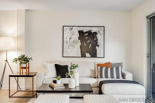 living area featuring hardwood / wood-style floors