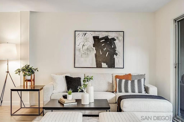 sitting room with hardwood / wood-style floors