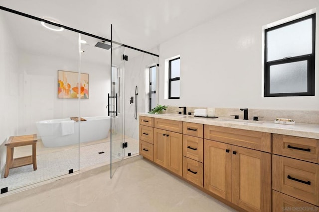 bathroom with vanity, concrete floors, and independent shower and bath